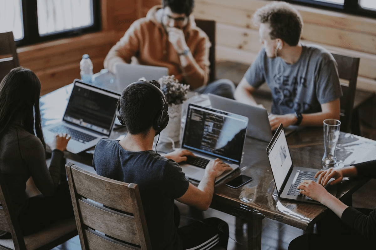 Professional software engineering team collaborating in a modern office